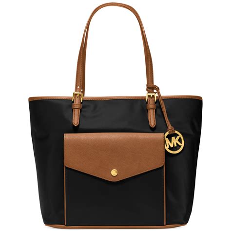 michael kors jet set item large pocket tote black|Michael Kors jet set luggage.